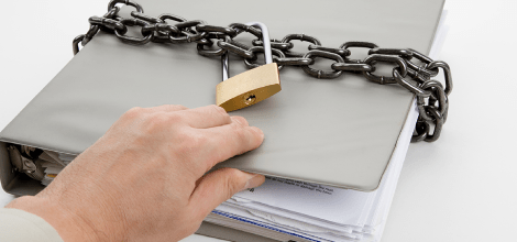 Chain and padlock around a confidential file